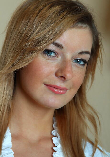 Slim young Ekaterina D exhibits her ass and spreads her legs 