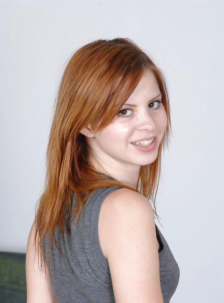 Sylphlike hungarian red-haired teen Judy Smile in lingerie likes some hot foot fetish in office