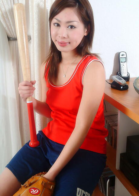 Sexy asian brunette teen Yumi reveals big boobies and spreads her legs 